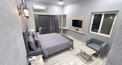Casa De Celebrations Room Type - FAB - Deluxe King Room with Pool or Garden View Casa De Celebrations Room Type - FAB - Deluxe King Room with Pool or Garden View