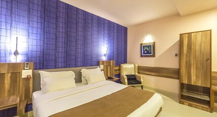 HOTEL POOJA GARDEN AND LODGING Room Type - Premium Suite Room
