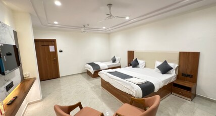 Hotel Madhav Inn Room Type - Super Deluxe Room ( Triple Bed )