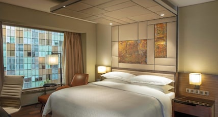 SHERATON GRAND BENGALURU WHITEFIELD HOTEL & CONVENTION CENTRE Room Type - Junior Suite Club Lounge Access with Bathtub and Living Area SHERATON GRAND BENGALURU WHITEFIELD HOTEL & CONVENTION CENTRE Room Type - Junior Suite Club Lounge Access with Bathtub and Living Area