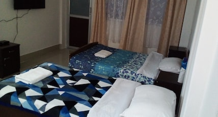 The River View Homestay Room Type - Triple occupancy bedroom with one queen size bed and one single bed The River View Homestay Room Type - Triple occupancy bedroom with one queen size bed and one single bed