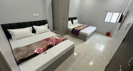 Shivashram Guest House Room Type - Four Bed AC Room