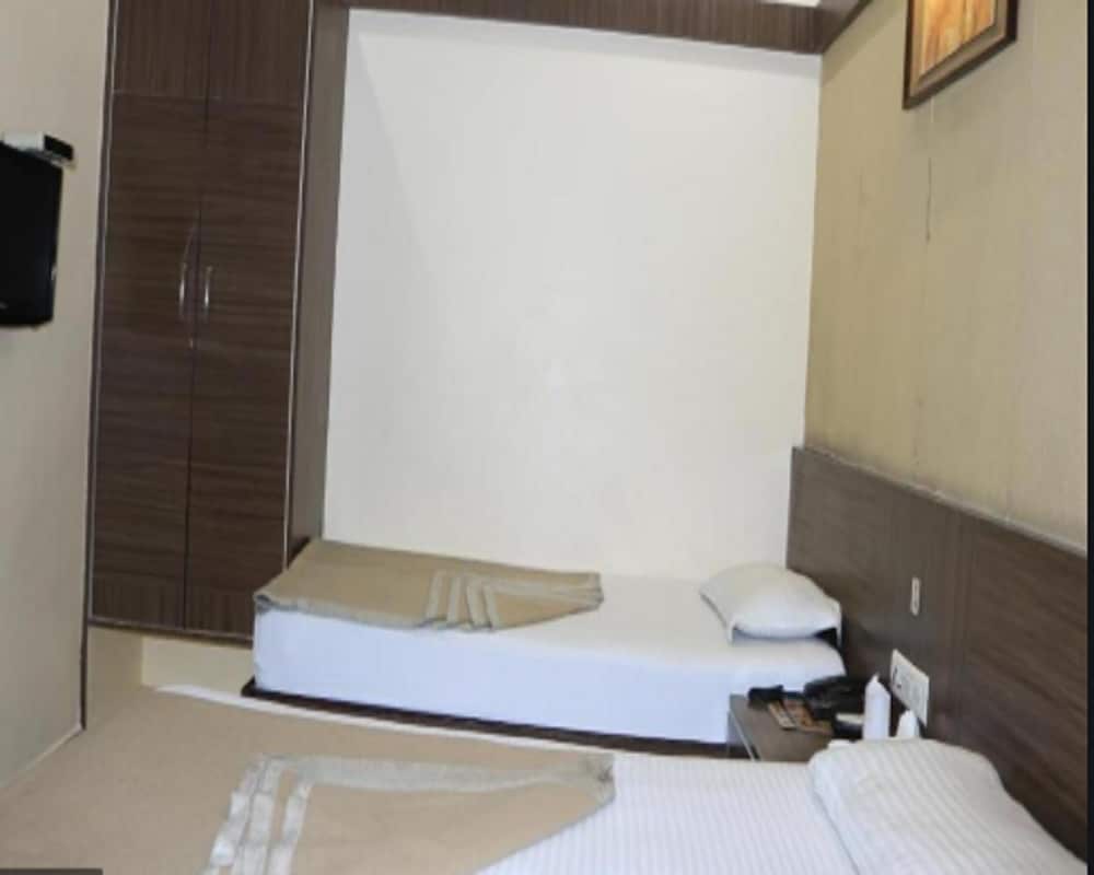 Hotel Ashish  - Tap to explore photos