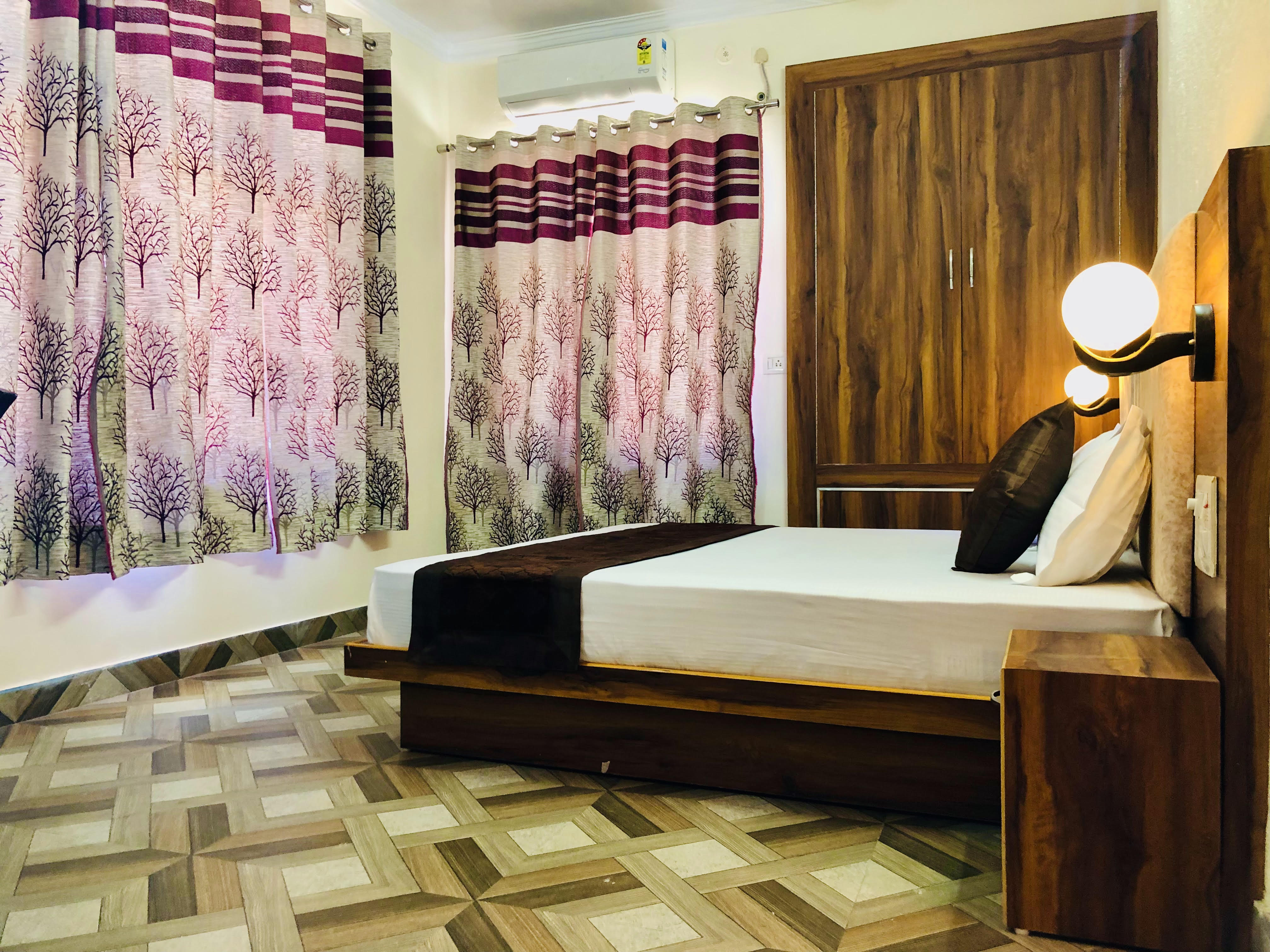 Trinetra guest house - Tap to explore photos