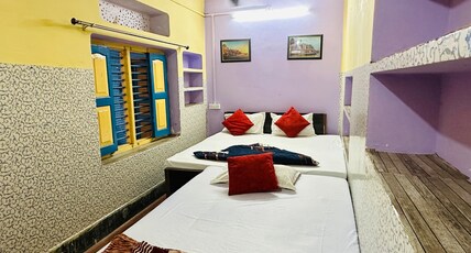 Suraj Inn Room Type - Basic triple bed Sharing washroom