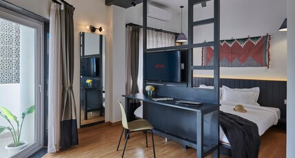 Poshtel VNS | A Boutique Stay Room Type - Corner Suite with Balcony