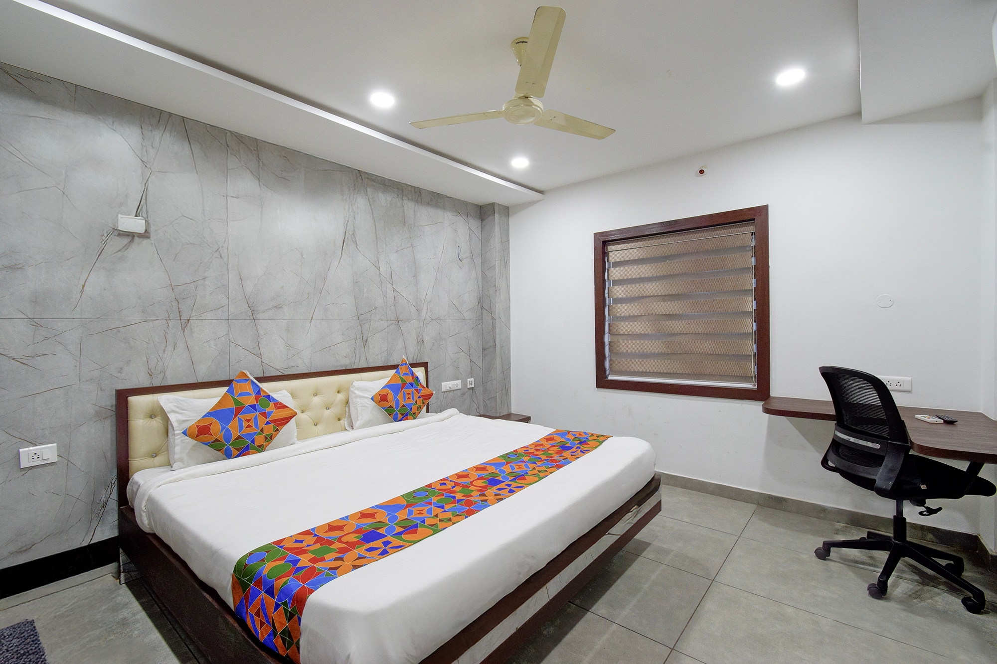 FabHotel Sushmitha Inn - Tap to explore photos