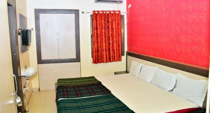 HOTEL DWARKAMAI  Room Type - Family Four Bed Room A.C.