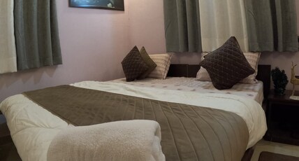 Corbett aroma homestay and restaurant Room Type - Bedroom 102