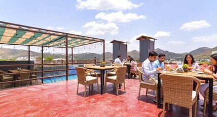Mangal Residency Rooftop Pool Room Type - Deluxe Room