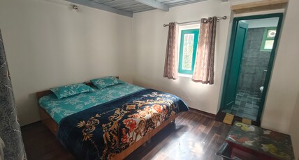 The Eleventh Homestays Room Type - Deluxe Room Ground Floor