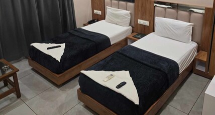 HOTEL SARVOTTAM Room Type - Executive Room Twin Bed