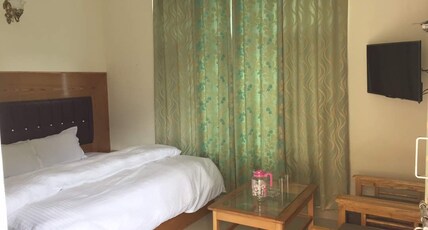 Hotel Ambika Bliss Manali Room Type - Deluxe Family Suite( 2 Interconnected rooms) 1st Floor