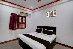 Rooms of Hotel O Airport Lotus Stay Inn
