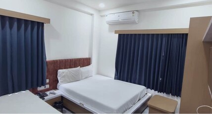 Hotel Radhe Inn Room Type - Deluxe Three Bed Room