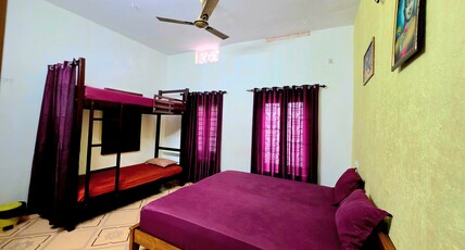 Red Poppy Home Stay Room Type - Deluxe Non AC Family Room