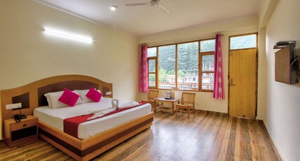 J.J Regency Room Type - Deluxe Cozy Room with Mountain Facing Balcony