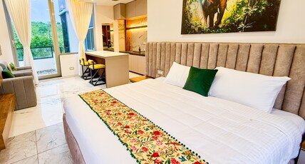 Monsoon Mist Room Type - Elephant Grove, Studio Apartment with Western Ghat Mountain Views, AC, Private Kitchen and Living Ar