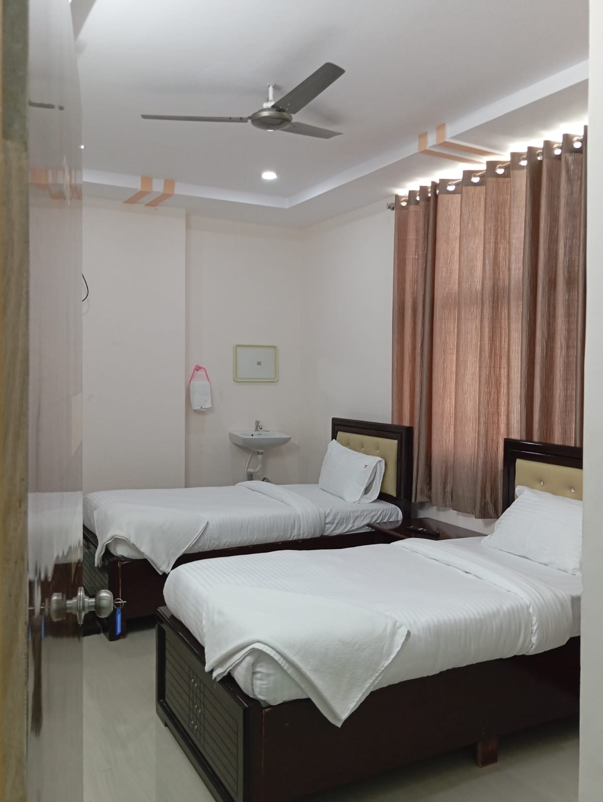 V4 Hotel - Tap to explore photos