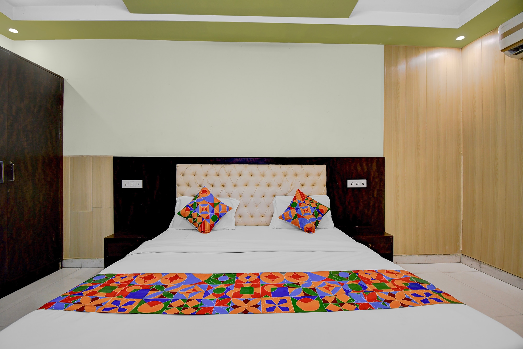 FabHotel Family Inn - Tap to explore photos