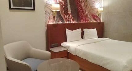 Krishna palace hotel Room Type - DELUXE ROOM