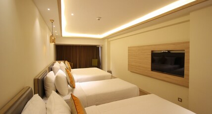 Jagadish International - Palace Road Room Type - Premium Family Room