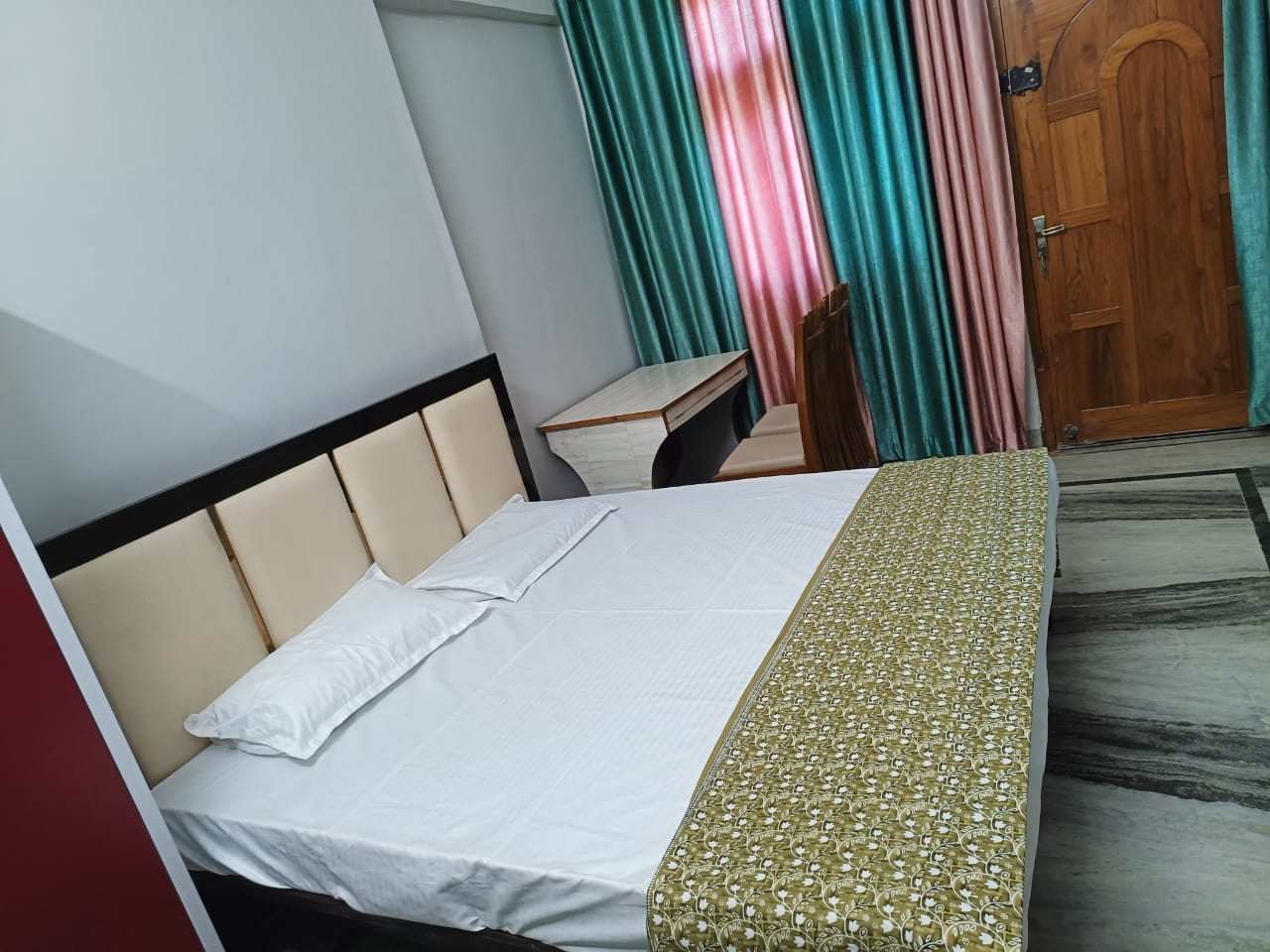 Arya Holiday Home - Tap to explore photos
