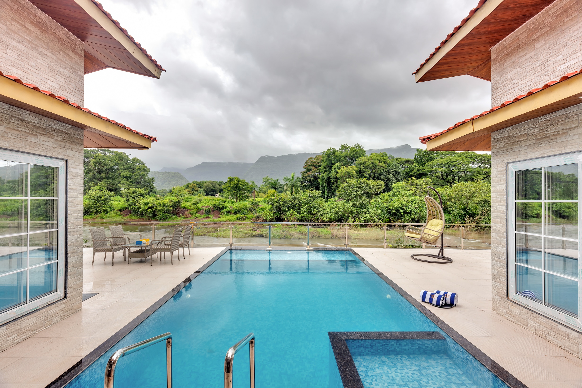 SaffronStays Riverdeck Vista - Tap to explore photos