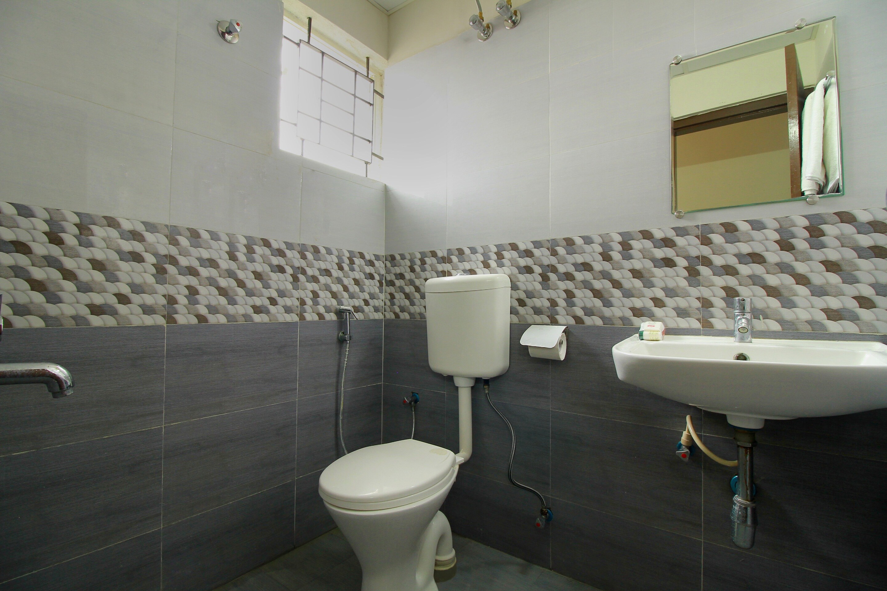 Hotel O Manu Residency - Tap to explore photos