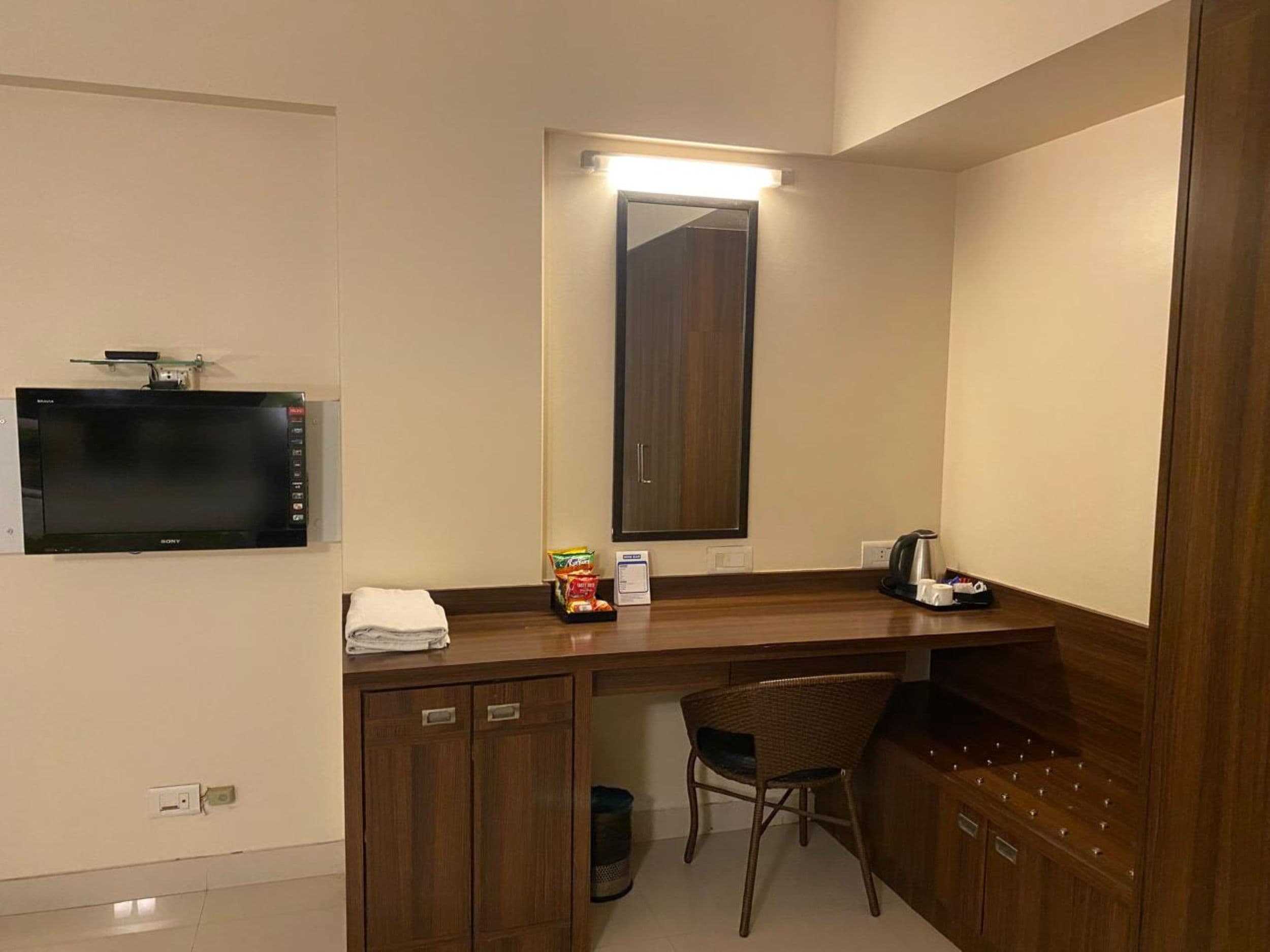 Hotel The Moneta (Near FC College) - Tap to explore photos