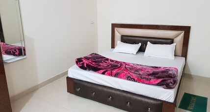 DHUNNA GUEST HOUSE Room Type - DELUXE AC ROOM