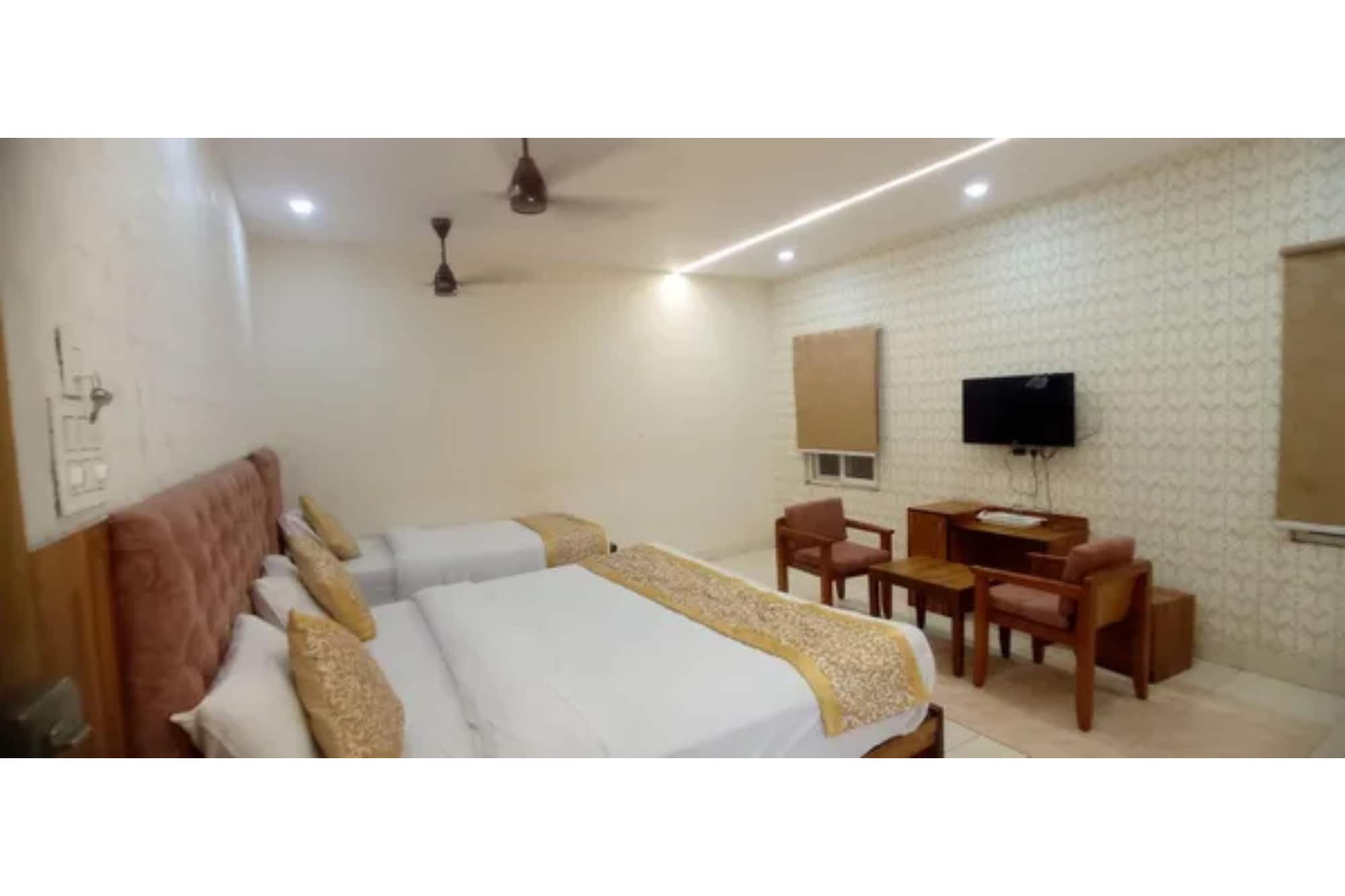 FabHotel Sree Surya Residency - Tap to explore photos