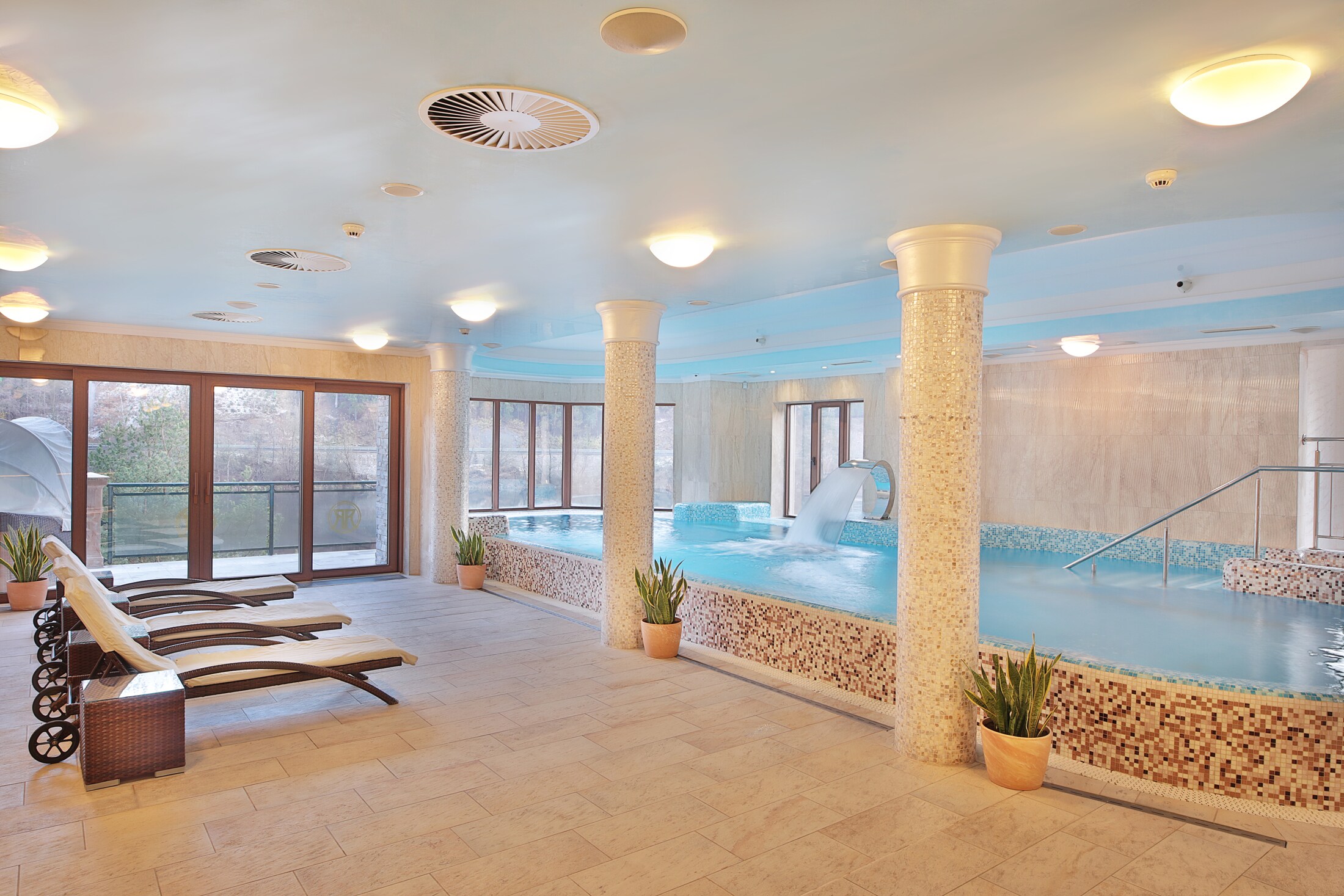 Retro Riverside Wellness Resort - Tap to explore photos