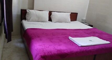 Raja Guest House, Near Railway Station Room Type - Super Deluxe Room