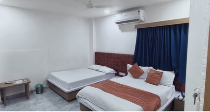 Hotel Radhe Inn Room Type - Deluxe Four Bed Room