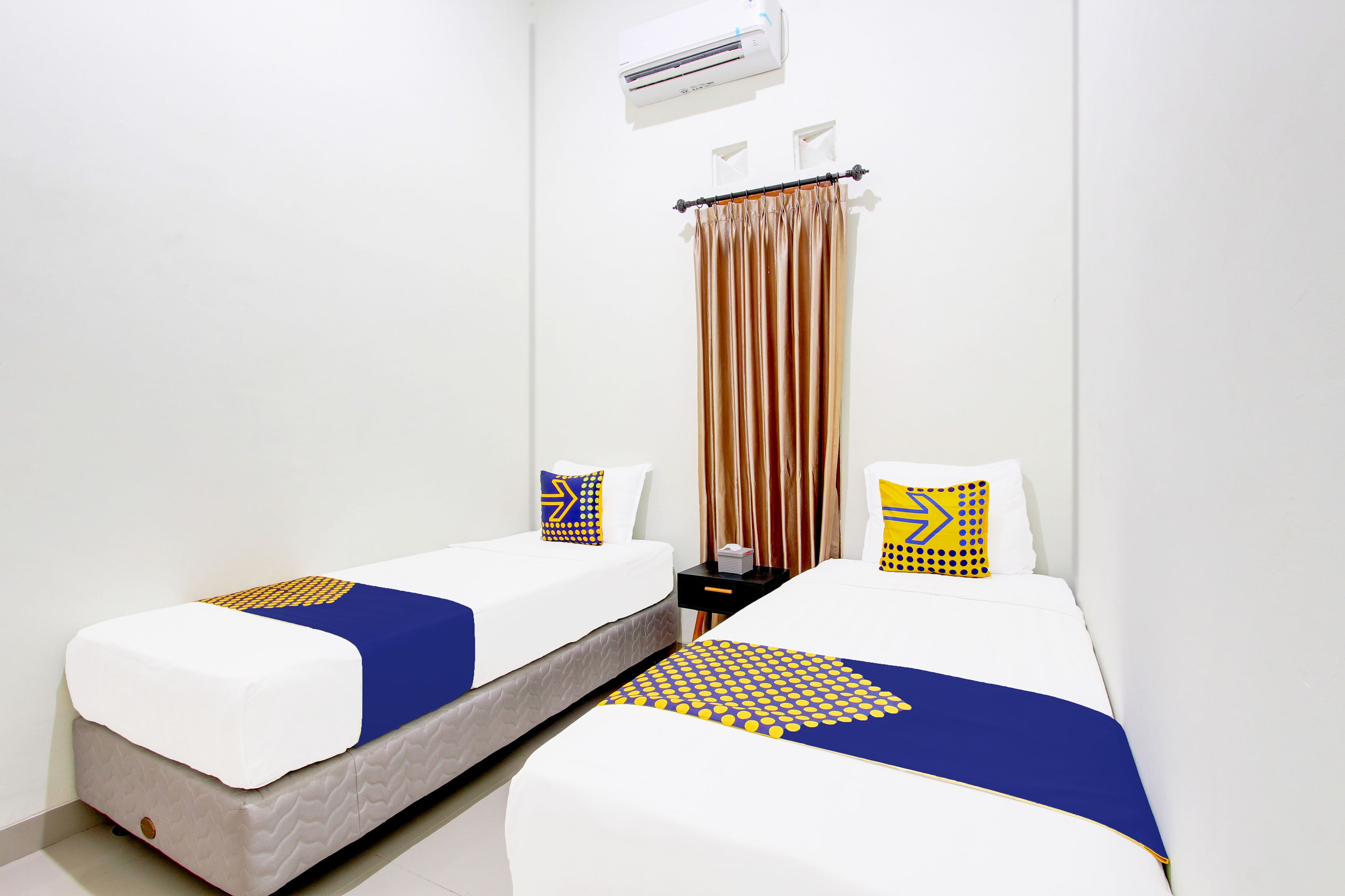 Hotel O Tinampi House Syariah - Tap to explore photos