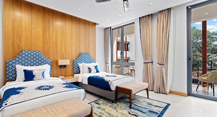 The Astor - All Suites Hotel Candolim Goa Room Type - Junior Suite Twin Bed - City View The Astor - All Suites Hotel Candolim Goa Room Type - Junior Suite Twin Bed - City View