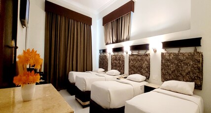Signature Inn Diera Room Type - Quadruple Room - Parking subject to availability