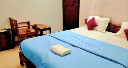 Red Poppy Home Stay Room Type - Deluxe Non AC Double Room