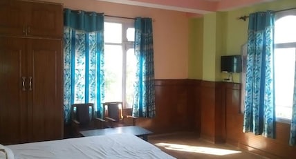 Hotel Snow flakes Room Type - DELUXE ROOM Hotel Snow flakes Room Type - DELUXE ROOM