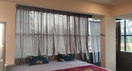 Raghavendra Palace Lodge Room Type - Deluxe City View Room