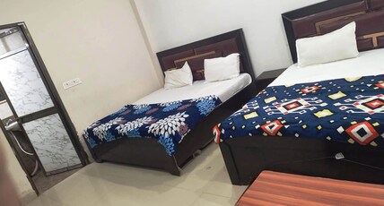 HOTEL SAMRAT PALACE Room Type - Non-AC Deluxe Four Bed Room