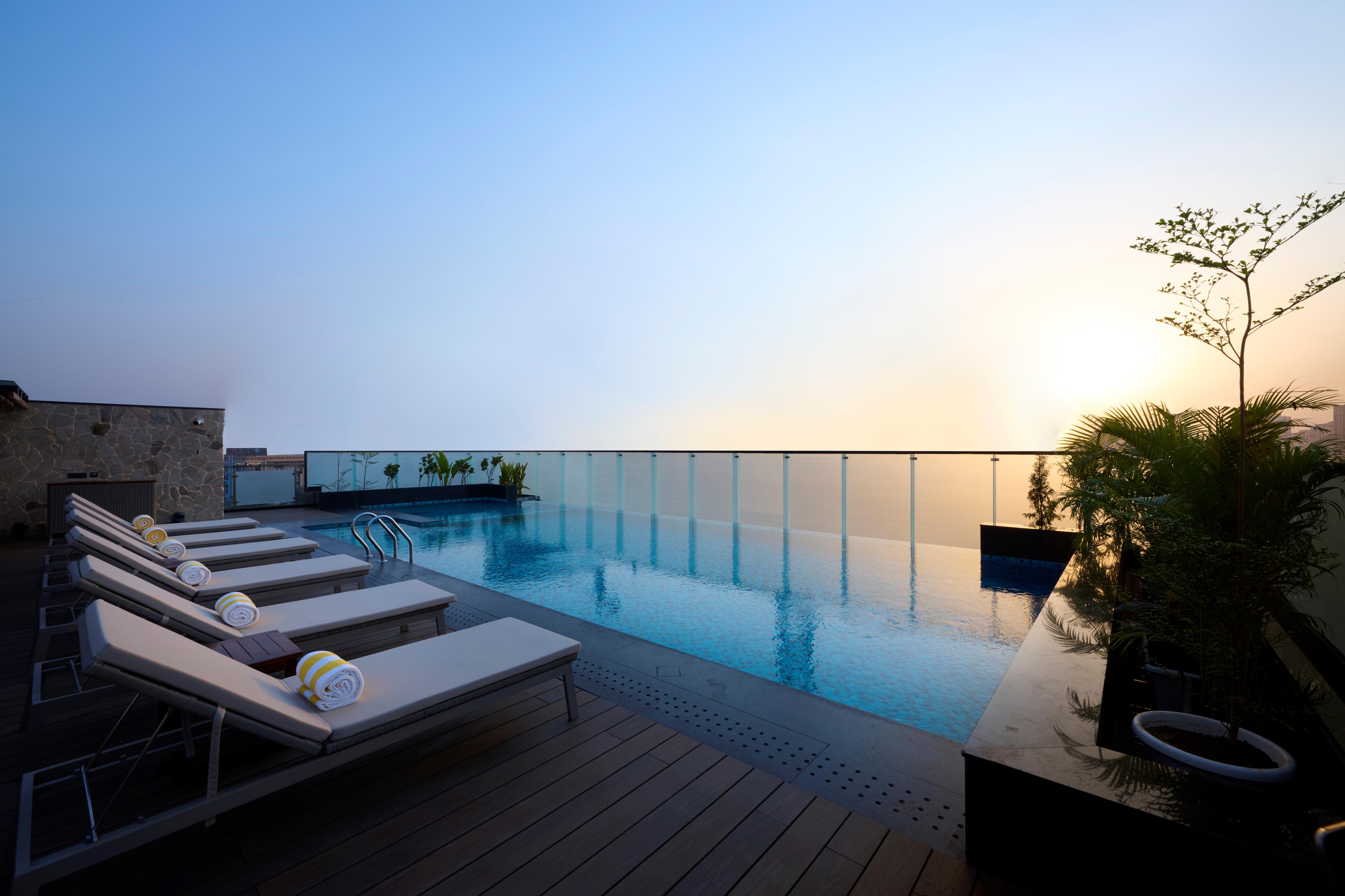 Iris Sarovar Portico - Tap to explore photos