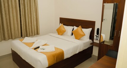 PPH Living Sri Sai Suites Room Type - Executive Deluxe AC Room