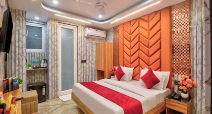 Hotel Sona Deluxe @ 2 min walk from New Delhi Railway Station Room Type - Queen Room With Smart TV