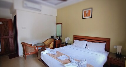 Bliss County Resort & Spa (Pure Veg) Room Type - Deluxe Room with Sitout Bliss County Resort & Spa (Pure Veg) Room Type - Deluxe Room with Sitout