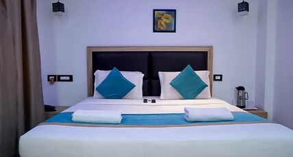 SHRI RADHA DAMODAR RESIDENCY Room Type - Deluxe AC Room
