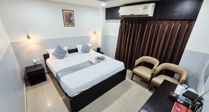 Pine Inn | ABC Bus Stand GS Road With Restaurant Room Type - Deluxe Room