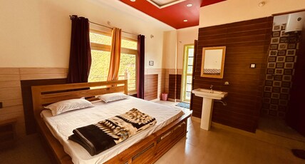 BADRISH HOTEL Room Type - Riverview AC Deluxe Room