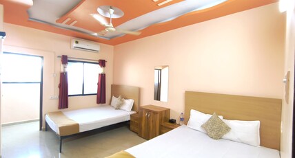 AMBIENT STAY Room Type - Family AC Room with Balcony